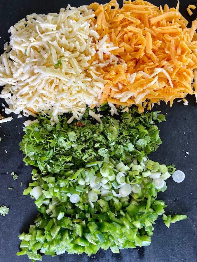 shredded cheese, diced jalapeno, diced onion, and cilantro