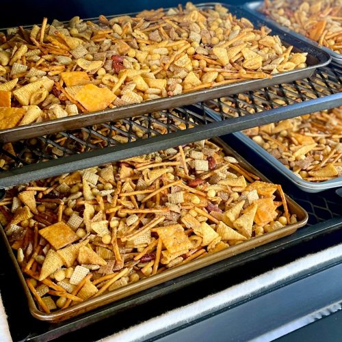 making smoked chex mix on a pellet grill