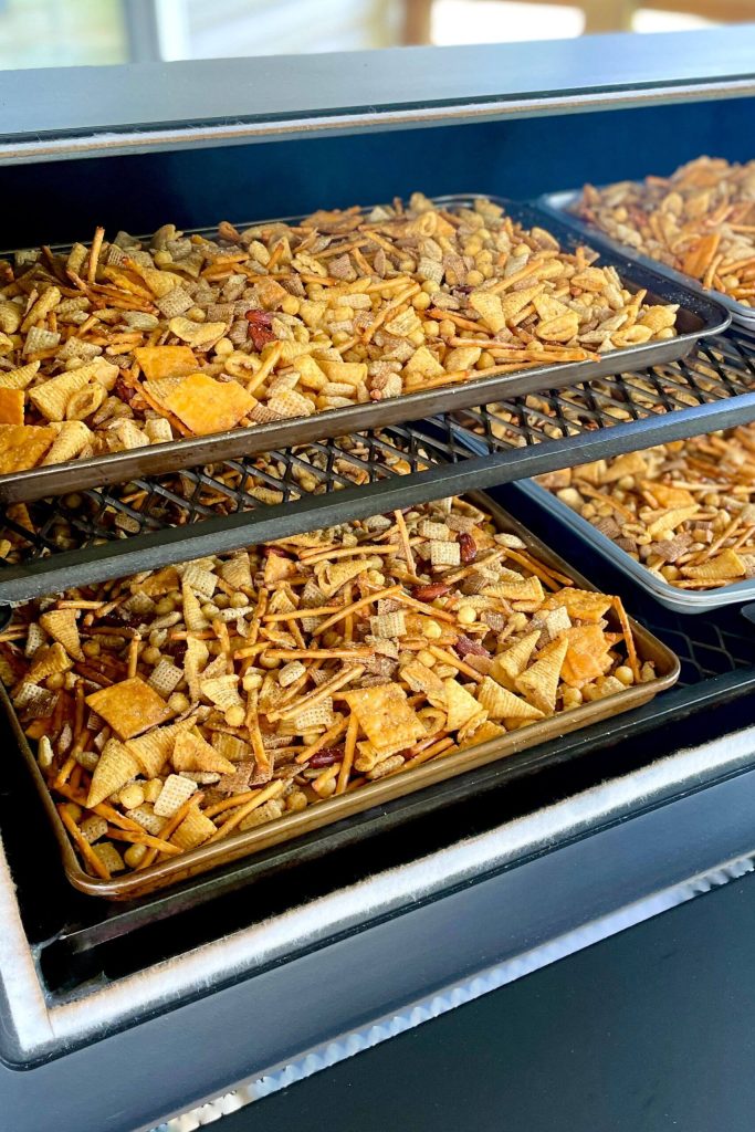 making smoked chex mix on a pellet grill