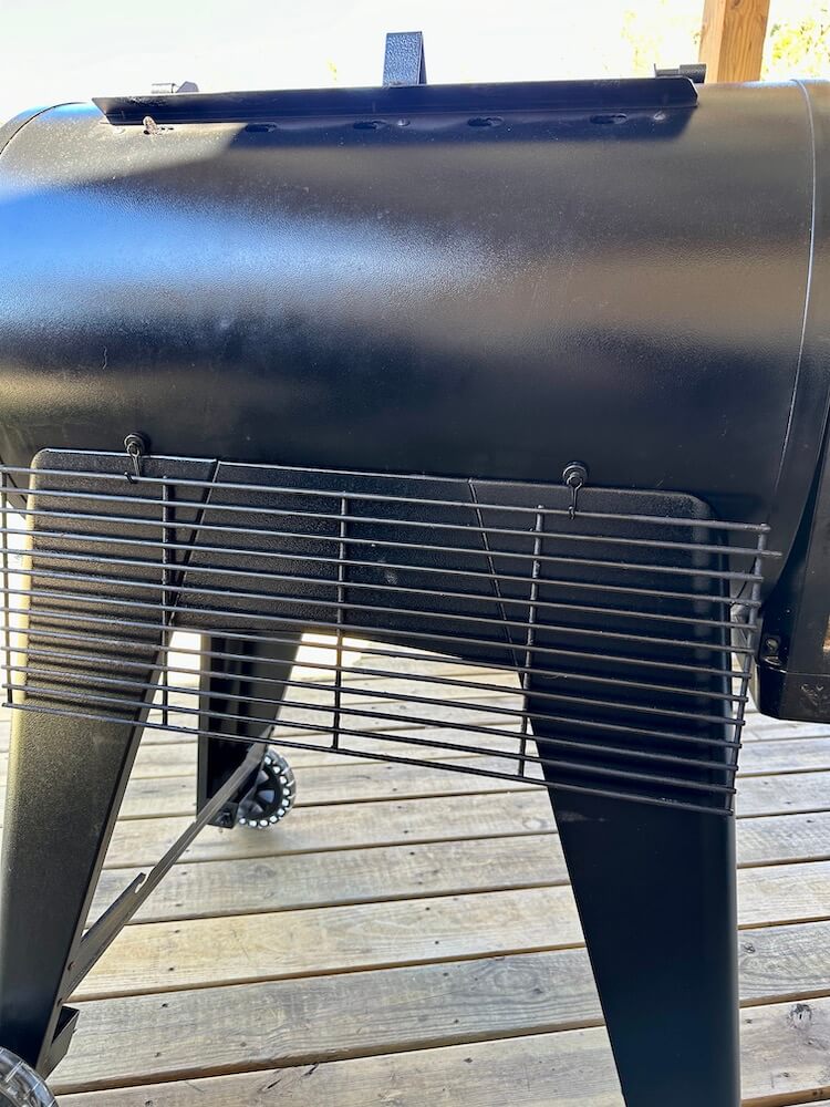 magnetic hooks to hang extra cooking rack on the back of a pellet smoker