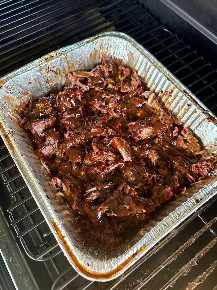 shredded smoked barbecue chuck roast on the pellet grill