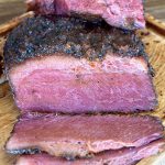 smoked pastrami on a cutting board
