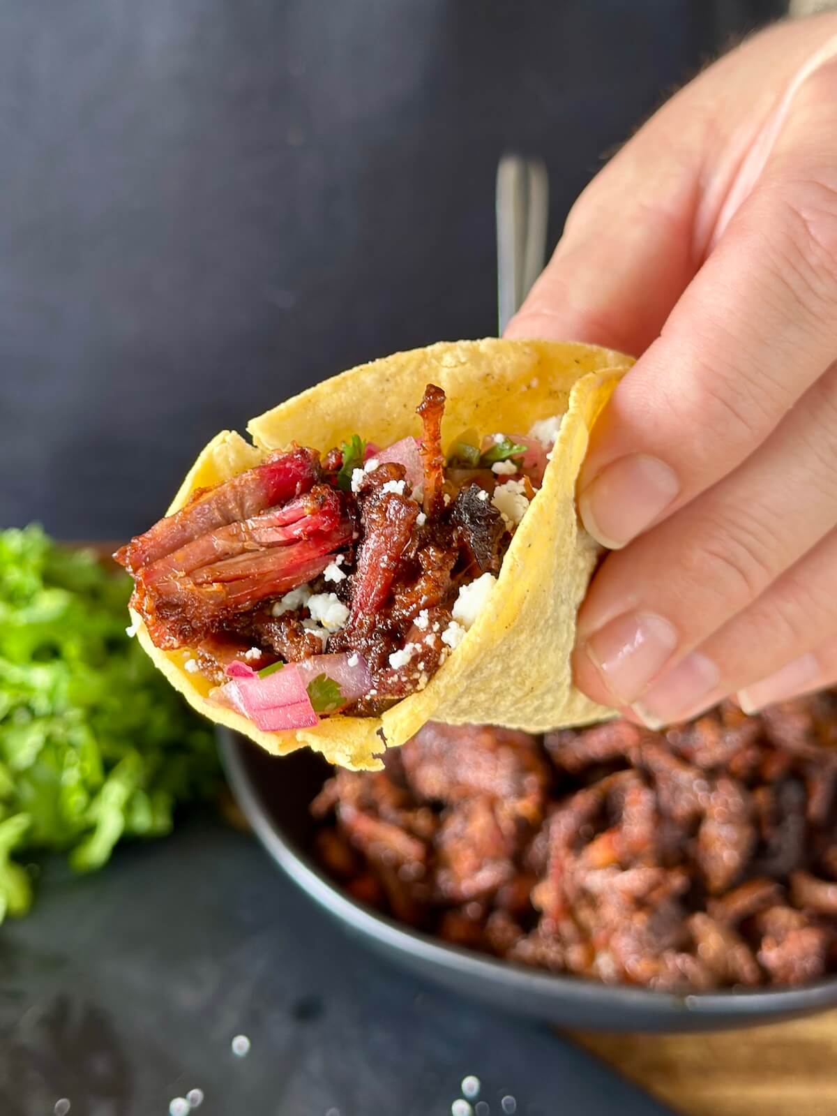 burnt end tacos with birria style brisket