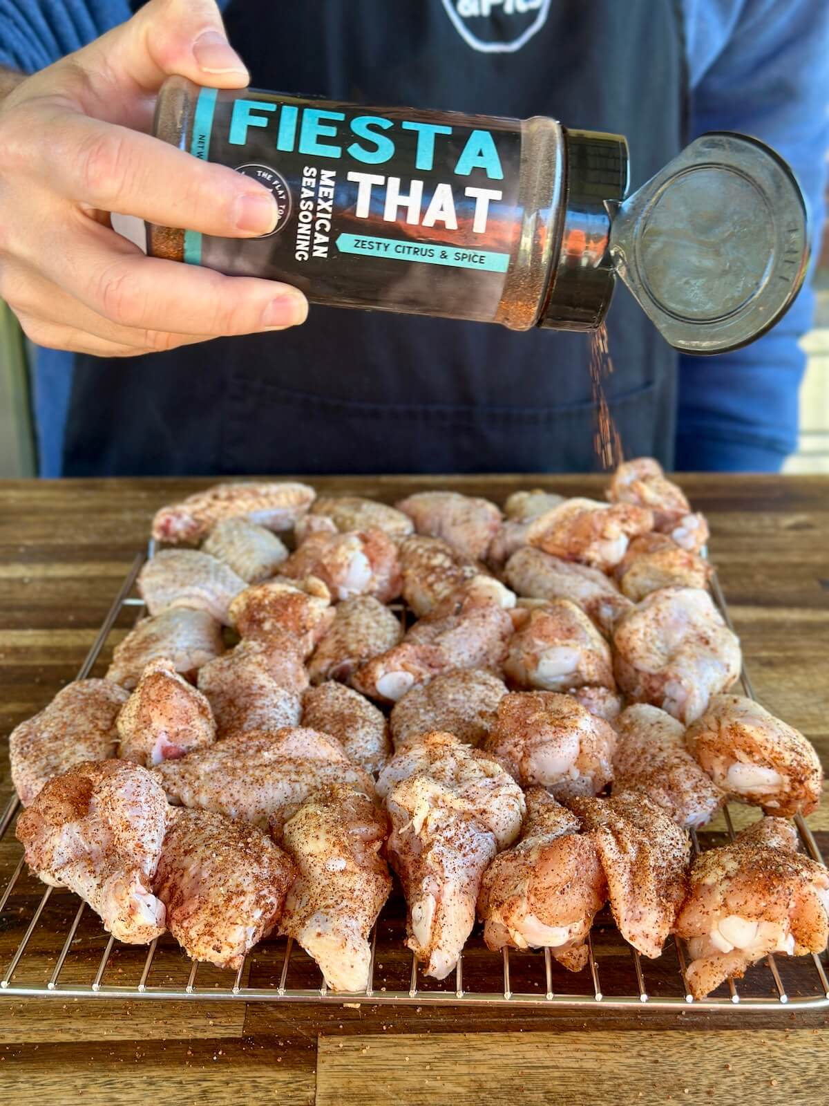 seasoning chicken wings with Fiesta That Mexican seasoning