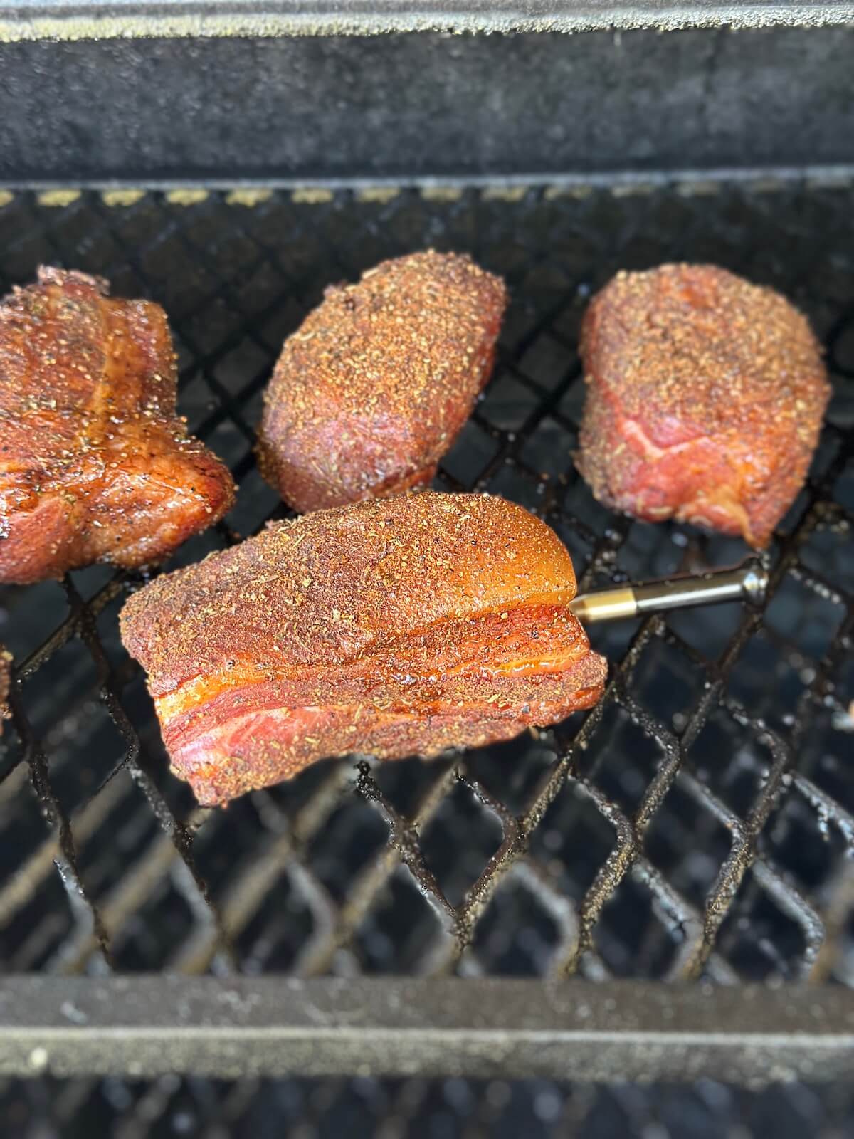 smoking pork tasso on a pellet grill
