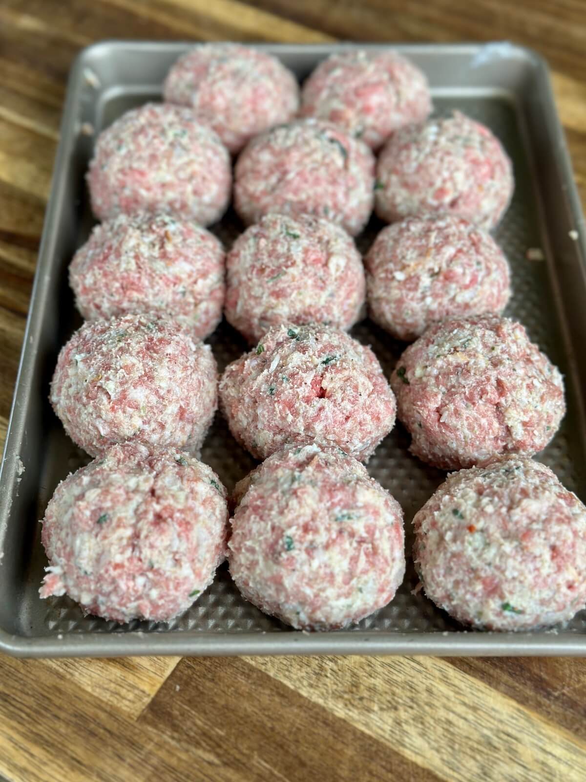 Italian meatball mixture rolled into meatballs