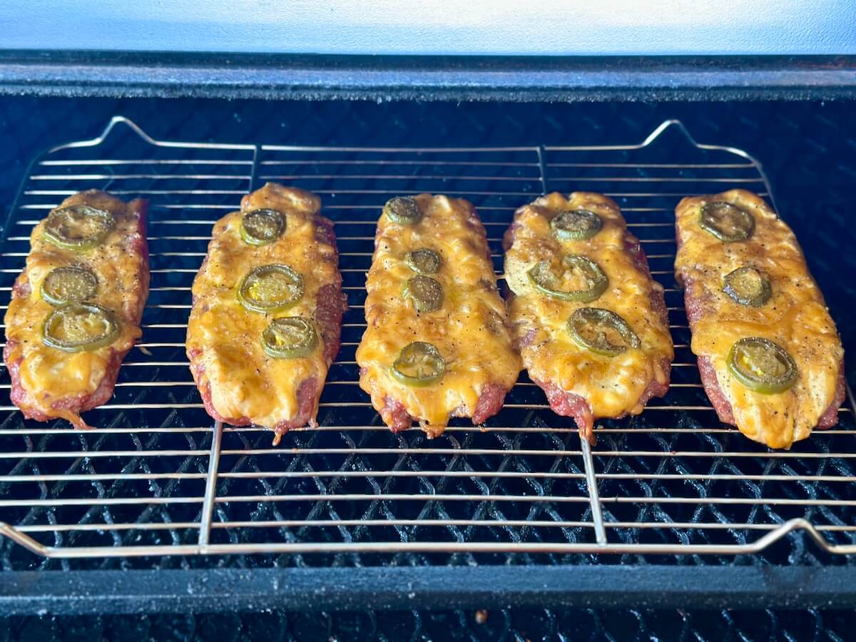 smoking sausage popper boats on a pellet grill