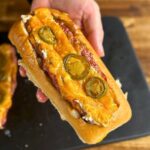 smoked sausage popper boats in a sandwich