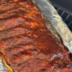 smoked pork ribs on a smoker