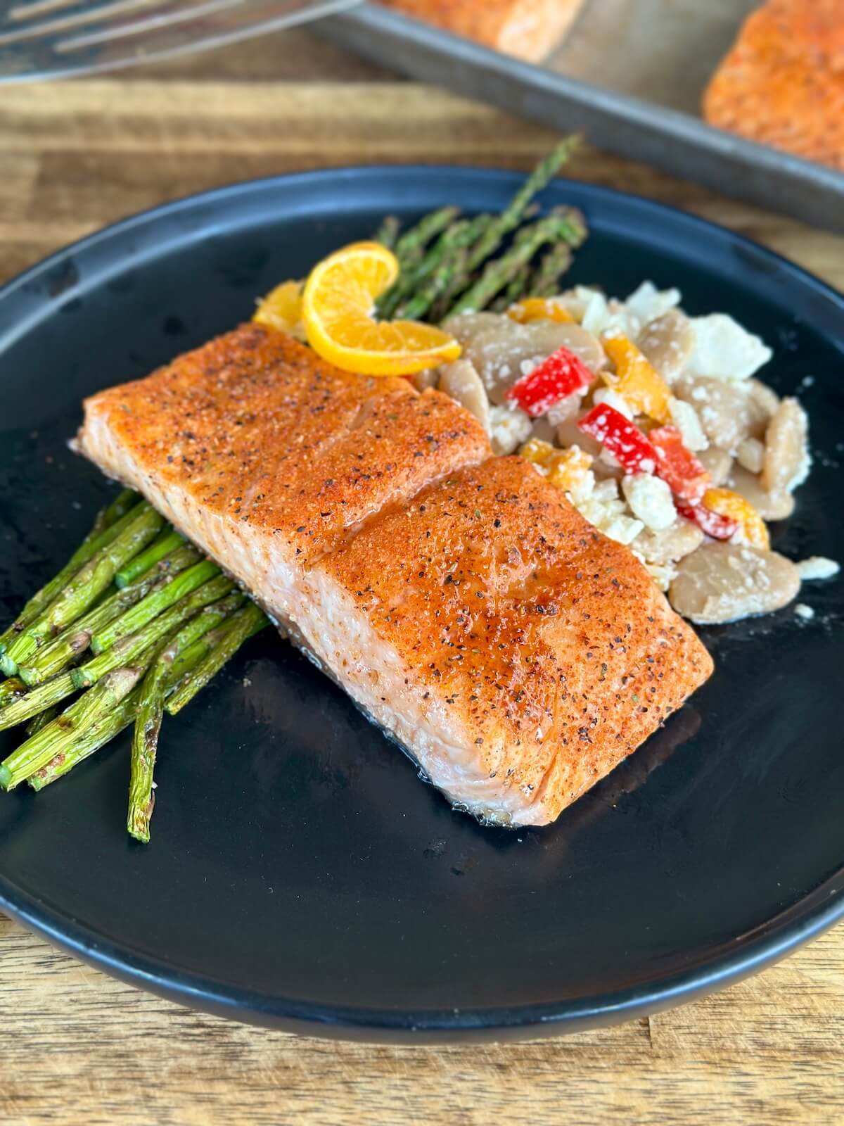 pellet grilled salmon with asparagus on a plate