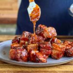 adding a sticky Asian glaze to smoked pork belly burnt ends