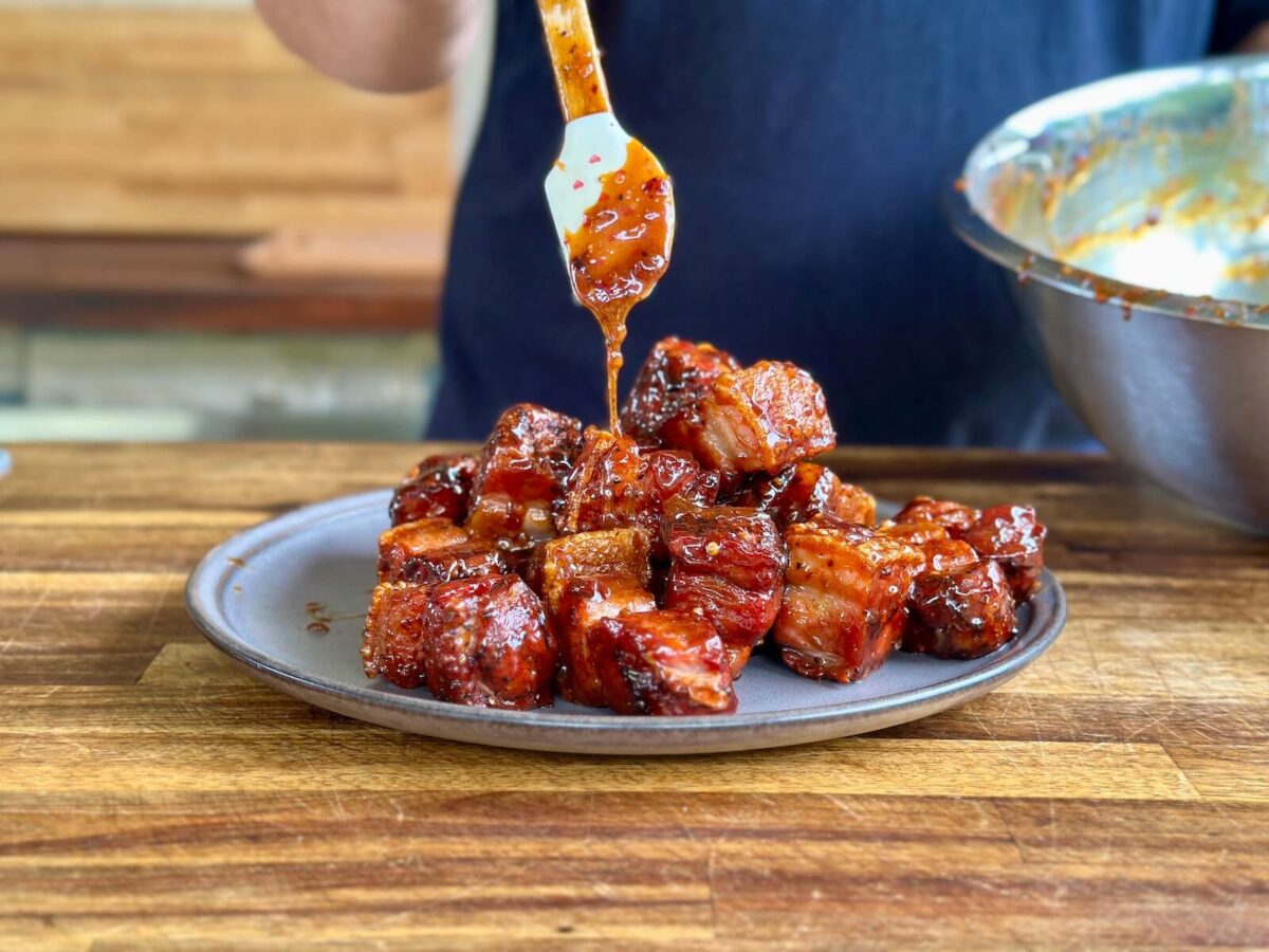 adding a sticky Asian glaze to smoked pork belly burnt ends