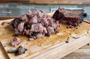 chopped brisket point on a cutting board