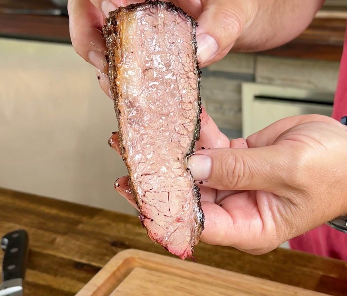 a juicy slice of smoked brisket point