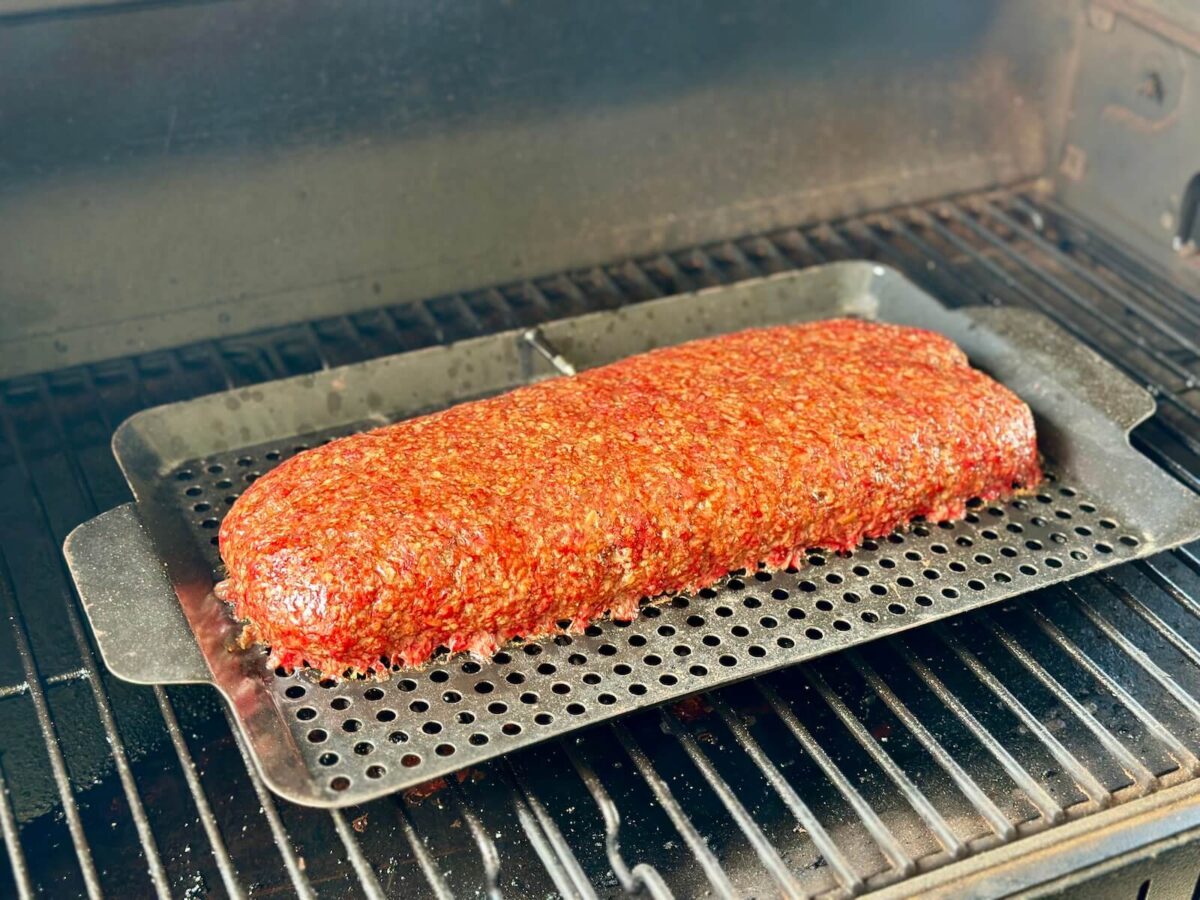 cooking a French onion meatloaf on a pellet grill