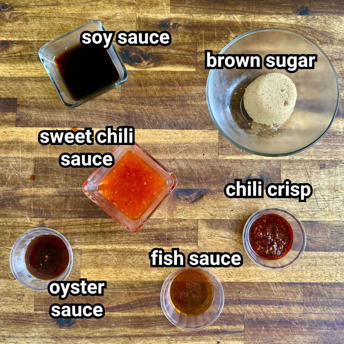 ingredients for an Asian bbq sauce measured out in bowls