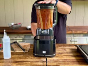 blending an al pastor marinade in a blender