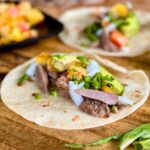 seared dove breasts in tacos with avocado, tomato, and onion