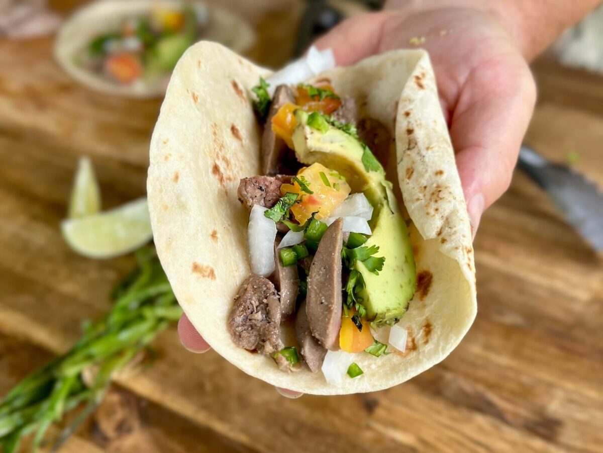 seared dove breasts in tacos with avocado, tomato, and onion