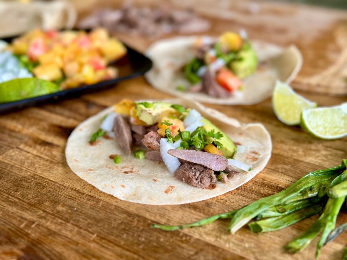 seared dove breasts in tacos with avocado, tomato, and onion