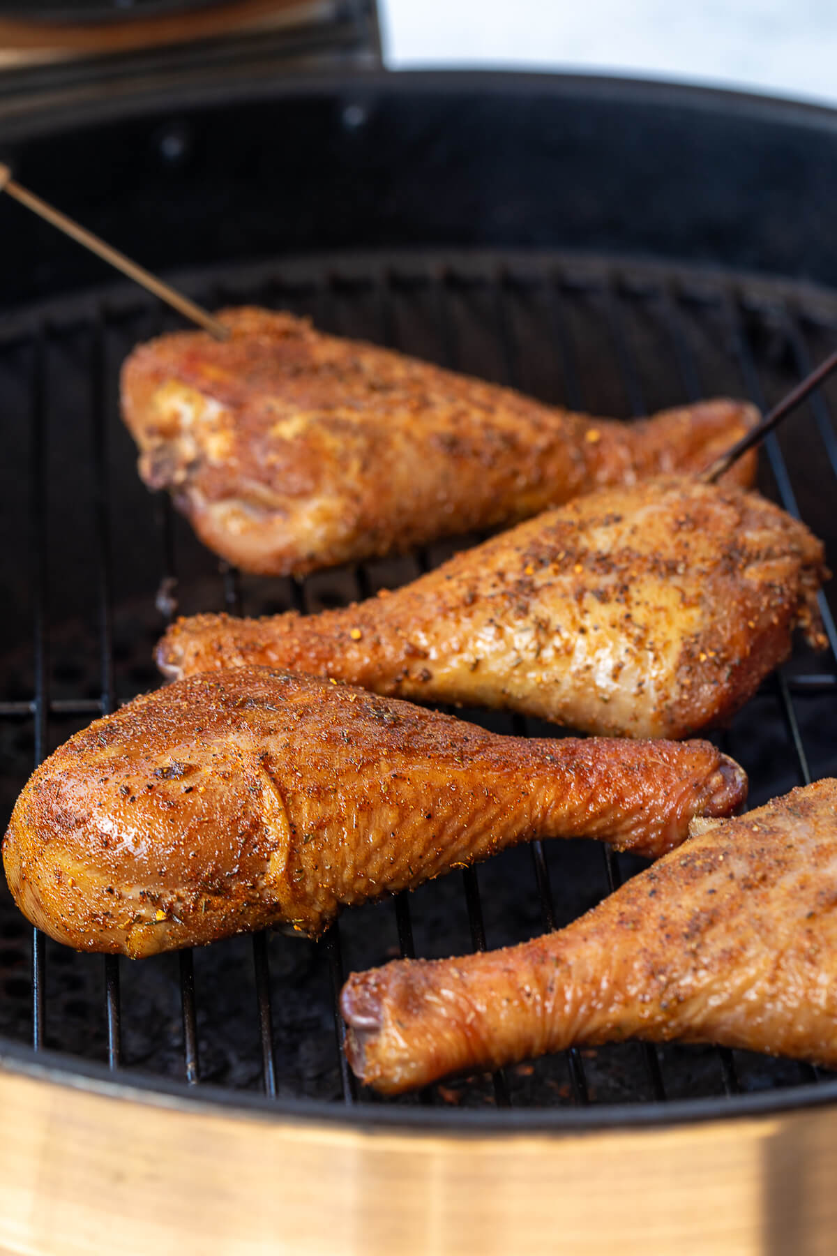 smoking turkey legs on a grill