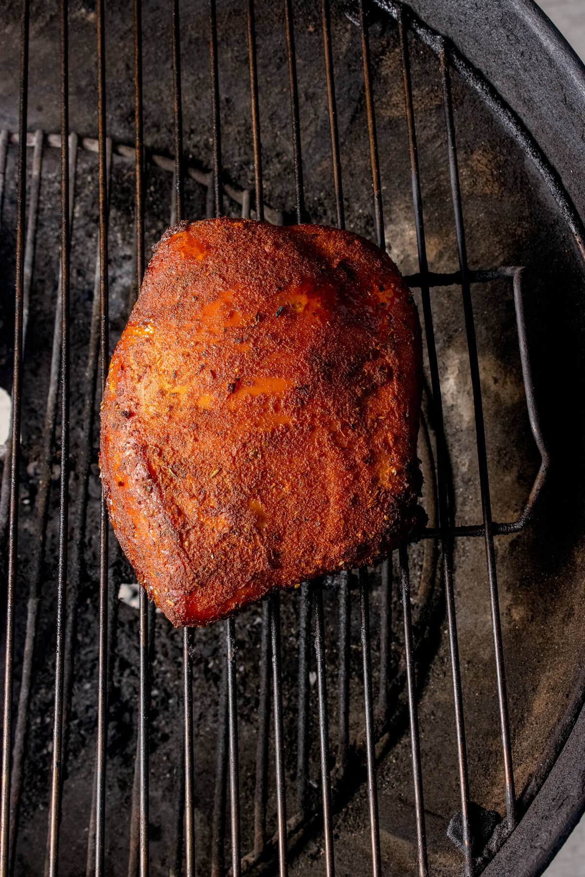 smoking a turkey breast on a kettle style charcoal grill