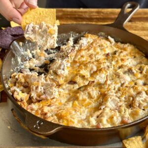 smoked crack chicken dip in a cast iron skillet